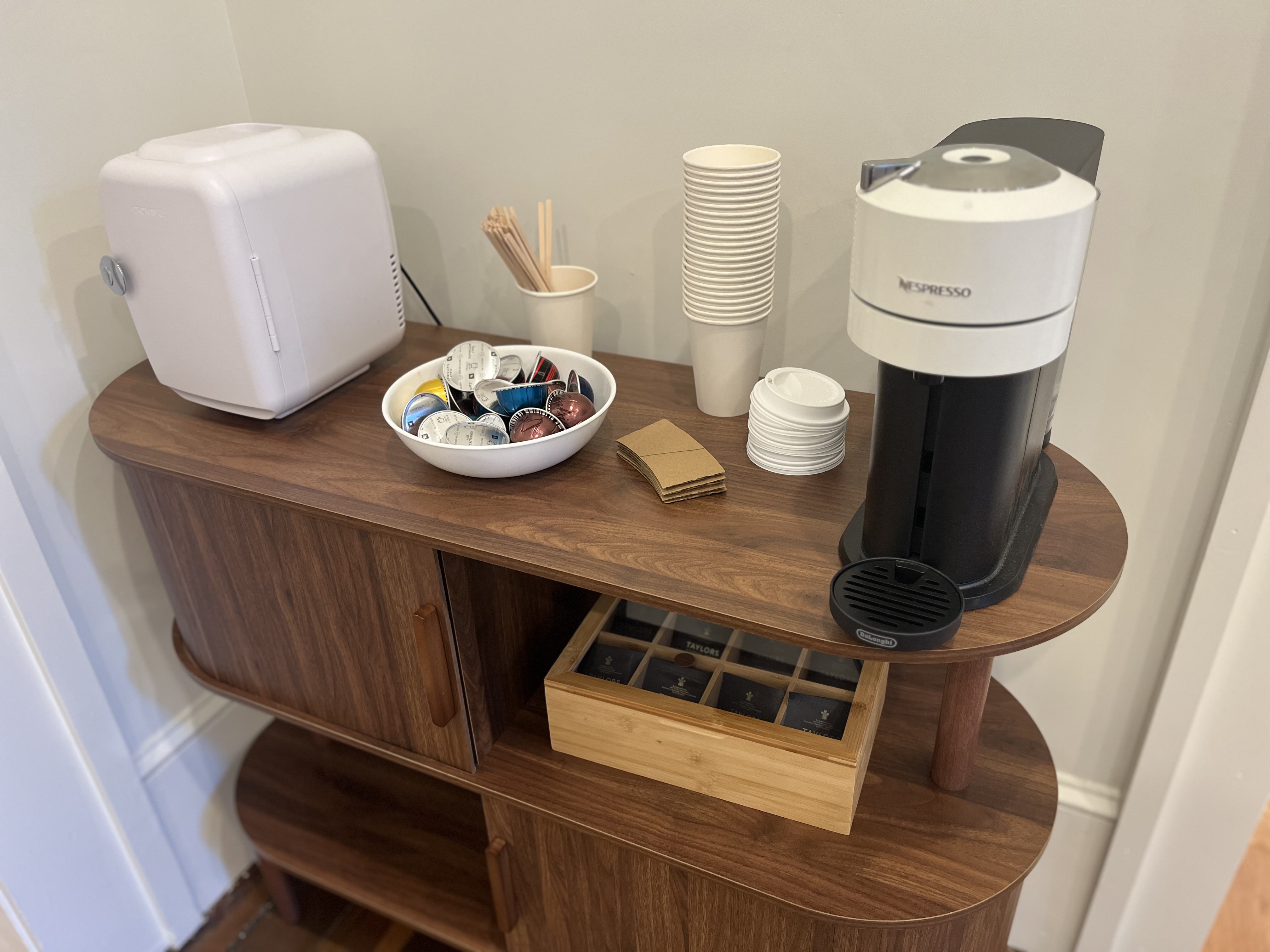 Complimentary Nespresso coffee bar with tea selection and capsules